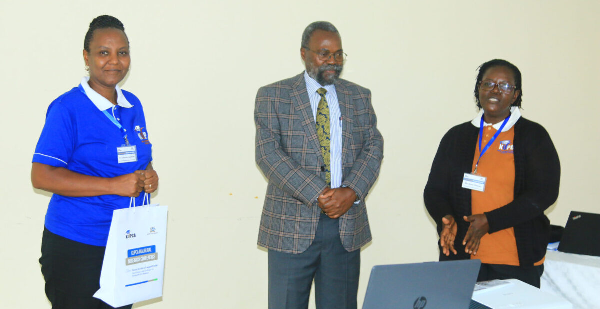 From left: Dr. Catherine Amulundu, Prof Joseph Mailutha and Dr. Rose Otieno pose for a photo before gifting Prof Mailutha after deliering his Keynote Speech. PHOTO/Kisii University Media.