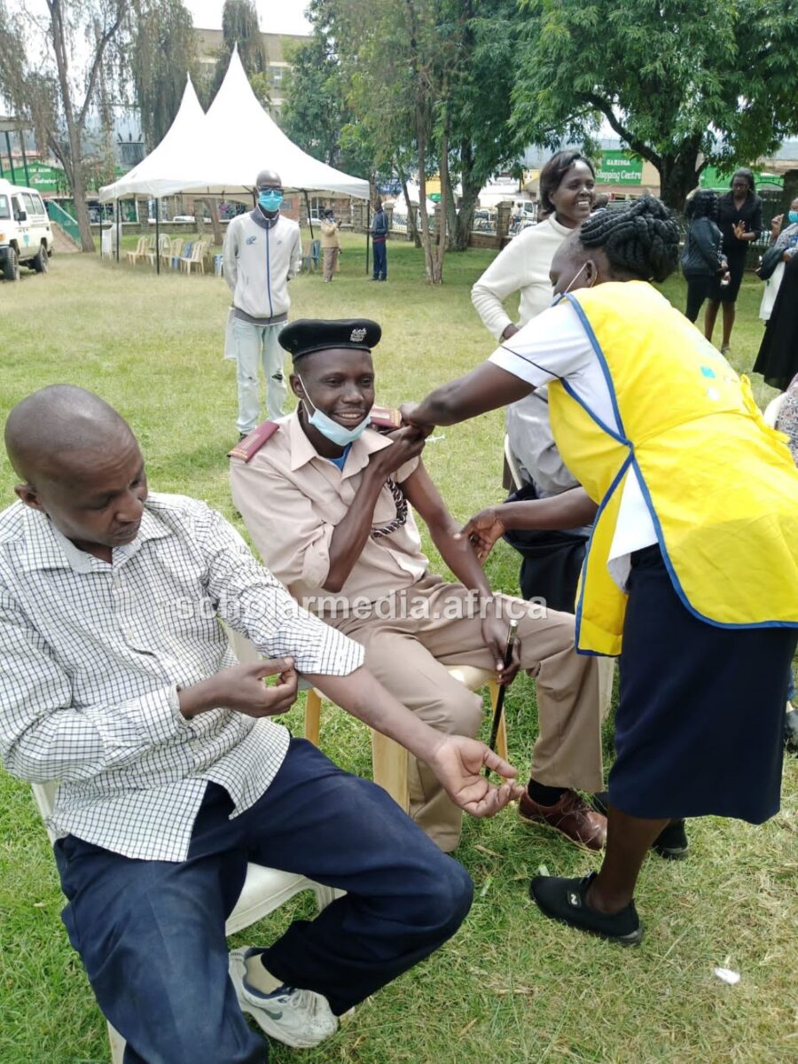Omar getting his booster shot during one of the vaccination campaigns against covid-19 in Baringo county. PHOTO/Janet Kiriswo, The Scholar Media Africa.