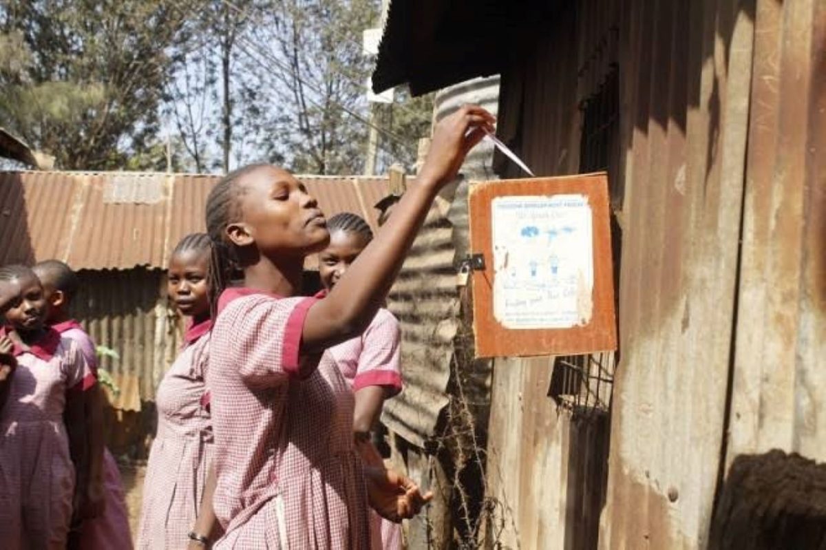 Girl giving her opinion through a suggestion box. PHOTO/Courtesy.