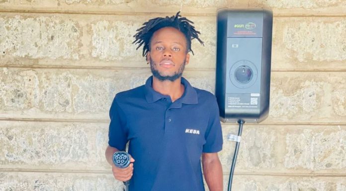 GGFI: Accelerating e-mobility vision through awareness, innovation GGFI founder, Ratemo Mabeya, holding the EV charging infrastructure they have developed for use at GGFI. PHOTO/GGFI.