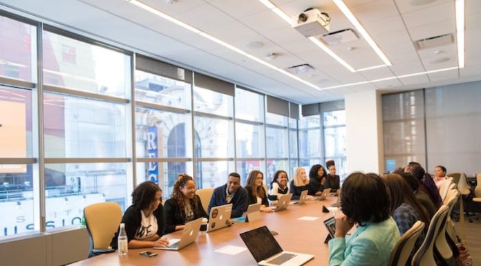 Future of work: Artificial Intelligence, reinventing workplace productivity A team of workmates in a boardroom. AI will not take away white-collar job soon, but is already impacting work modes and professions. PHOTO/Unsplash.