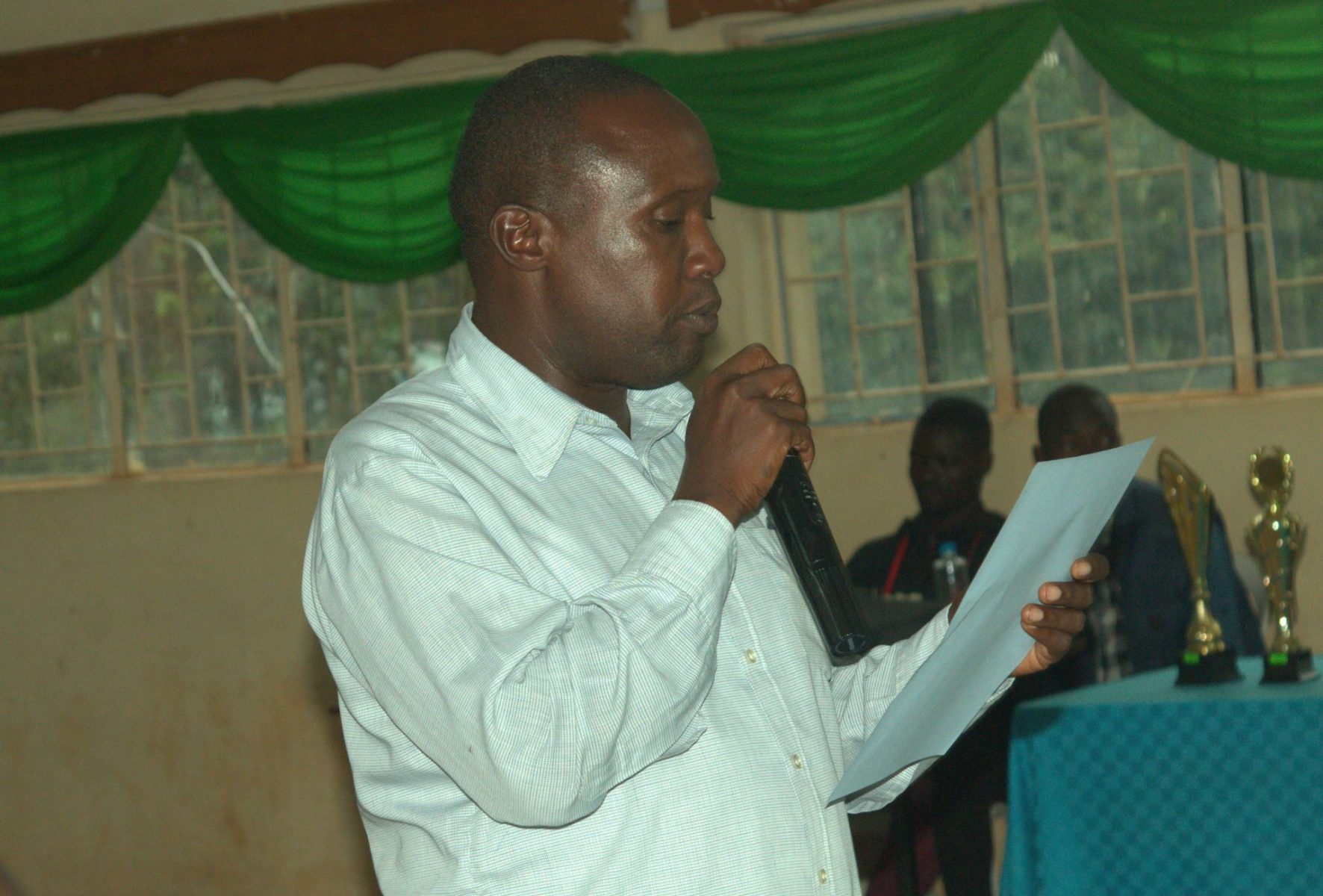 Dr. George Areba, who represented Prof. John Akama, Kisii University VC, delivering the VC's speech. PHOTO/Boaz Khuteka, KSU Media.