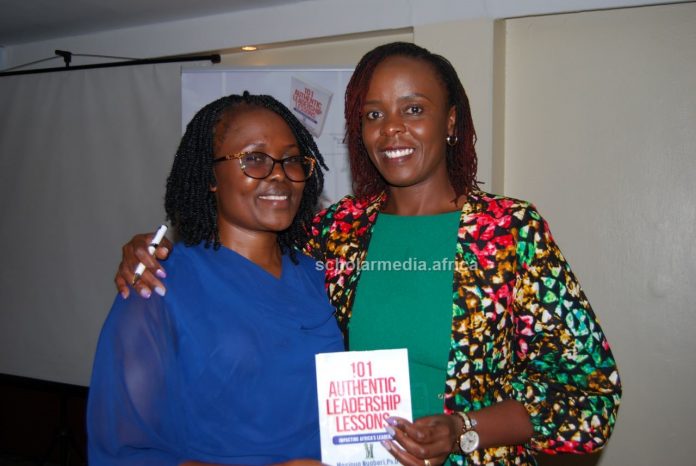 Dr. Mosinya Nyaberi poses with Judith Omondi during her book launch on March 9, 2023 at Sarova Panafric Hotel, Nairobi. The two were fellows in the KAGHLP 2021/22 cohort. PHOTO/Kemunto Ogutu, Scholar Media Africa.