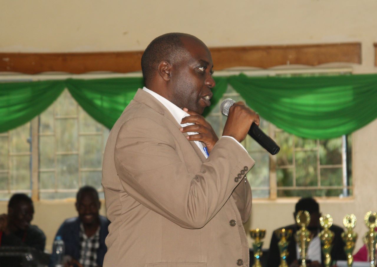 Dr. Evans Mecha, a lecturer at School of Arts and Social Sciences, addressing the participants after the occasion. PHOTO/Boaz Khuteka, KSU Media.
