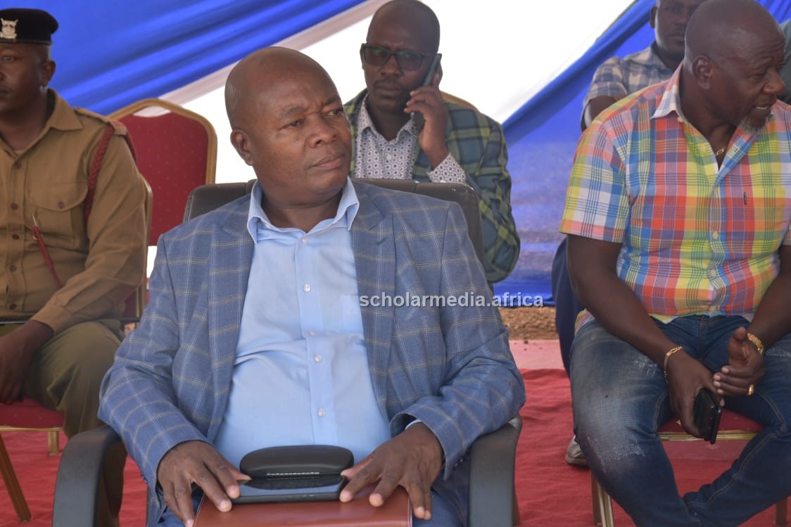 Dr. Charles Nzivo (center), the CEO of Kenya National Library Service (KNLS), following proceedings during the launch. PHOTO/Gilbert Ochieng, Scholar Media Africa.