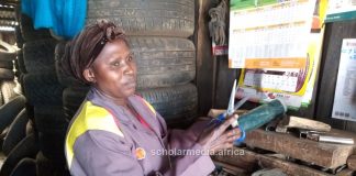 Breaking Barriers: Nzisa’s journey to becoming a mechanic Margaret Nzisa, who works at her brother's garage. PHOTO/Janet Kiriswo, Scholar Media Africa.