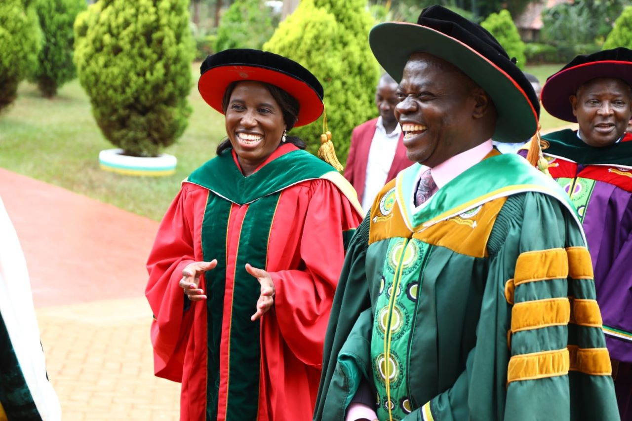 Higher Education and Research PS, Dr. Beatrice Inyangala chatting with MUST Vice Chancellor, Prof. Odhiambo. PHOTO/MUST.