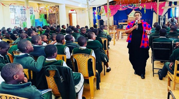 Edinah Kangwana, a mental wellness champion, addressing students at Mobamba High School, Kisii County, during a wellness and career talk. Mental health conversations among children and teenagers are vital in schools, homes and in communities. PHOTO/Courtesy.