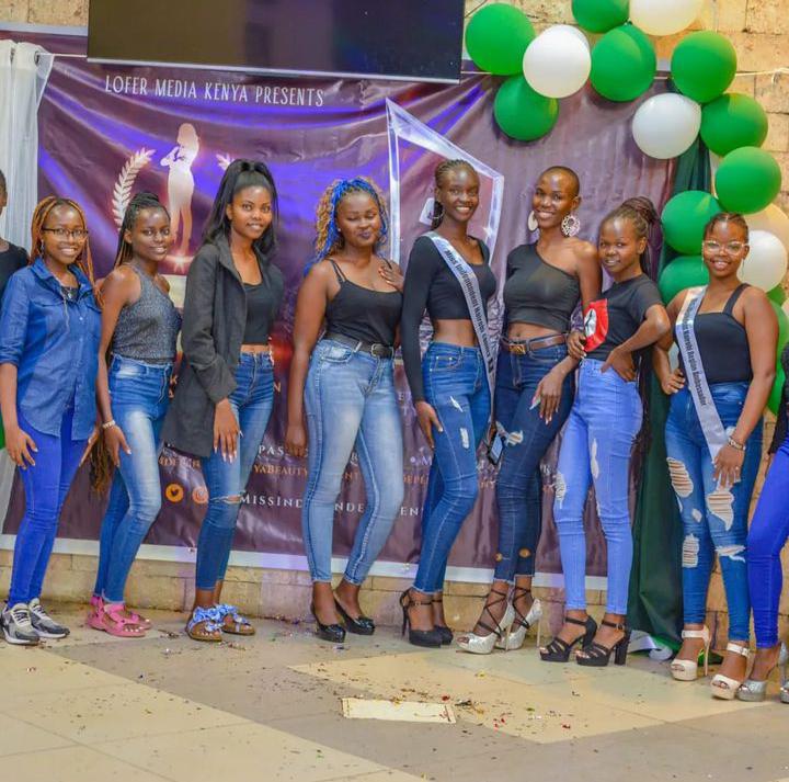 Models pose a group photo during a modeling event in Nakuru county. 