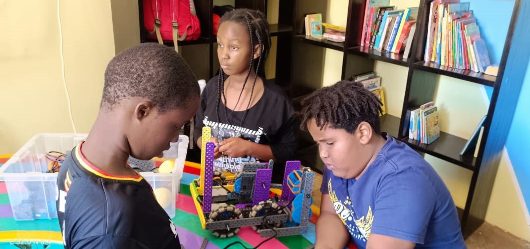 Aleem (right) and his colleagues working through their robot ahead of the competitions to be held later this month. PHOTO/Courtesy.