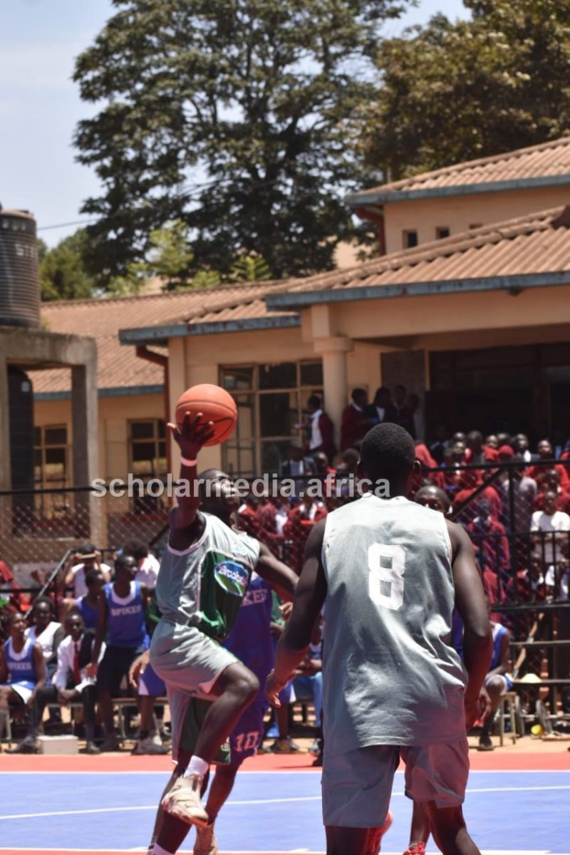 Fiston Sengemoja drives past Moi Forces Academy. PHOTO/Tebby Otieno, Scholar Media Africa.