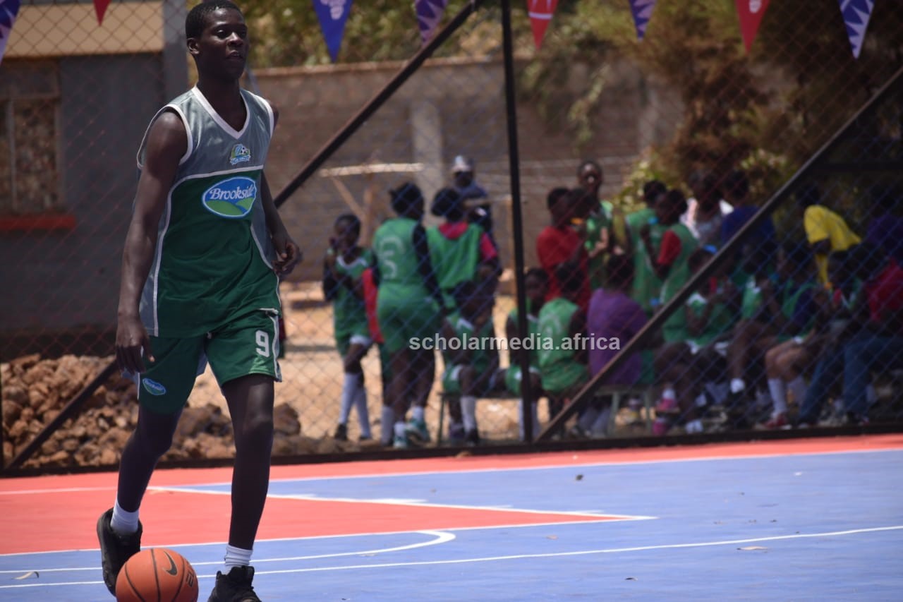 Michael Mwanakasala dribbles during a game. PHOTO/Tebby Otieno, Scholar Media Africa.