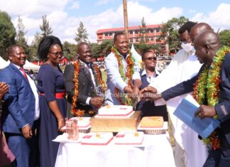 Cardinal Otunga High holds thanksgiving, gears up for position one nationally Invited guests and a section of the school management join Chief Principal Albert Ombiro (right) in cake cutting during thanksgiving on May 26, 2023, at Cardinal Otunga High School grounds. PHOTO/Boaz Khuteka, Scholar Media Africa.