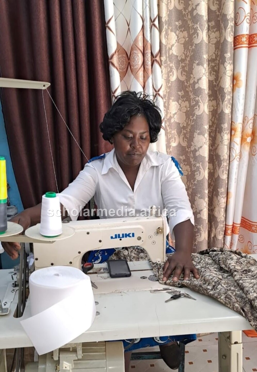 Doing what she does best. Since when she started the venture, she has opened three branches. PHOTO/Wanjiru Karangah, Scholar Media Africa. 