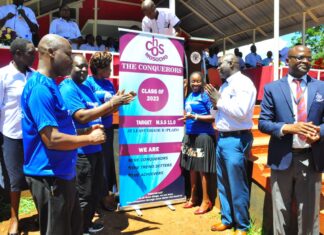 Lofty hopes as Cardinal Otunga High School launches 2023 KCSE target mean Mr. Albert Ombiro (second right), Chief Principal Cardinal Otunga High School Mosocho, Dr. Robert Wafula (second left), Chief Guest, join other guests and stakeholders during the unveiling of 2023 KCSE target mean and revision program on May 12, 2023, at the school's grounds. PHOTO/Courtesy.