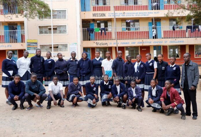 A section of the Journalism Club members and their Patron, Cosmas Nyabuti (far right), pose for a photo after a session with Scholar Media Africa team. Beyond promoting academic excellence, Mwongori High School has been keen in identifying and nurturing talent. PHOTO/Dan Nyamanga, Scholar Media Africa.