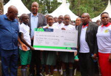 Nyamira Governor flags off beneficiaries of his sponsorship program Nyamira Governor Amos Nyaribo (second left) and CECM Education (far right) Emily Ongaga, and other county officials present a dummy cheque to the county education beneficiaries during the flagging off of the governor's sponsorship fund in Nyamira County on January 15, 2023. PHOTO/Dan Nyamanga, Scholar Media Africa.
